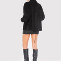 Sofia Sarkany Campera Ken negra de gamuza con espalda lazada. Modelo femenino y elegante para mujer, estilo moderno.