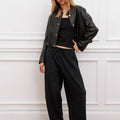 Campera Alo negra Sofia Sarkany, campera de cuero sintético corta con botones plateados, para un look urbano chic, moda mujer.